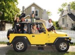 Amanda Flynn standing in her Jeep named "Waylon" celebrating her new publishing deal with Leslie T. DiPiero of Tom-Leis Music & co-publisher Victoria Shaw. Amanda's team includes (from left to right) Leslie, Victoria, Amanda Flynn, Penny Lou Everhard, and Kimberly June.