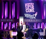 The Judds flip the switch to turn the Opry pink to fight breast cancer. 2010 Copyright Grand Ole Opry. Photo: Chris Hollo