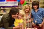 The Band Perry with Doak Elementary student Jocelyn Keefer. (L-R): Neil Perry, Jocelyn Keefer, Kimbery Perry and Reid Perry