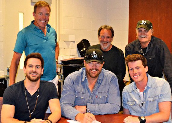 Front Row (L-R): Waterloo Revival’s Cody Cooper, Toby Keith, Waterloo Revival’s George Birge. Back Row (L-R): TKO Artist Management’s TK Kimbrell, Show Dog Nashville General Manager George Nunes, Show Dog Nashville VP Promotion Rick Moxley 